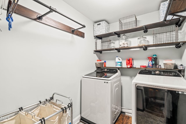 112 Nelson Ln, Clayton, NC 27527 - laundry room with separate washer and dryer and wood finished floors