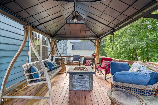 112 Nelson Ln, Clayton, NC 27527 - wooden terrace with an outdoor fire pit and a gazebo