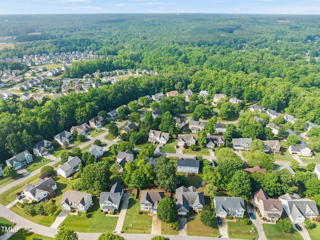 112 Nelson Ln, Clayton, NC 27527 - aerial view of residential area with a heavily wooded area