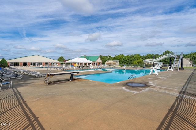112 Nelson Ln, Clayton, NC 27527 - community pool featuring a patio area and a water slide