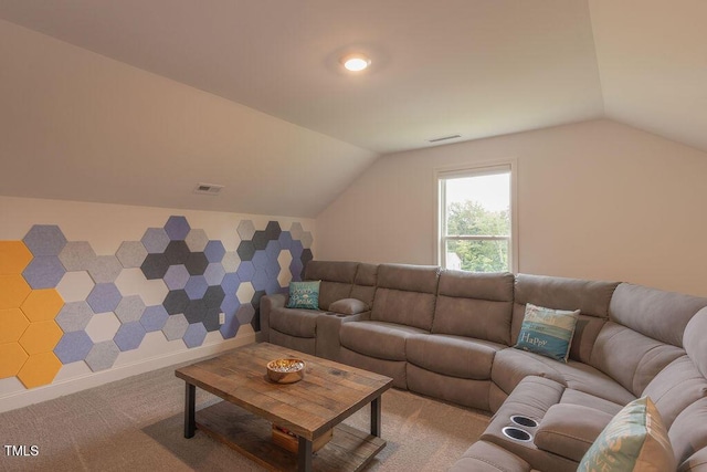 carpeted living room with vaulted ceiling and visible vents