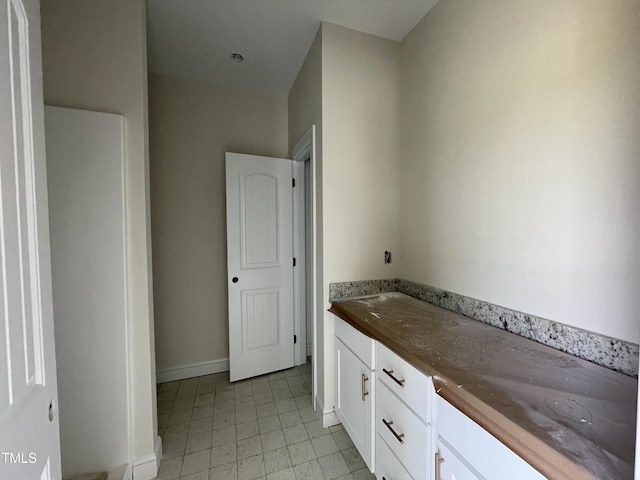 506 S Vance St, Fremont, NC 27830 - bathroom with baseboards and vanity