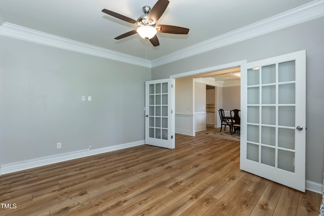 3536 Greenville Loop Rd, Wake Forest, NC 27587 - unfurnished room with french doors, crown molding, light wood-type flooring, a ceiling fan, and baseboards
