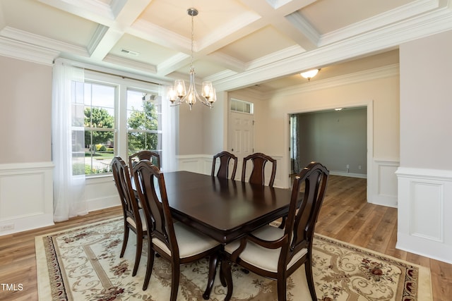 3536 Greenville Loop Rd, Wake Forest, NC 27587 - dining area with a chandelier, coffered ceiling, crown molding, beamed ceiling, and light wood-type flooring