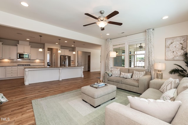 3536 Greenville Loop Rd, Wake Forest, NC 27587 - living area featuring ceiling fan, light wood finished floors, and recessed lighting