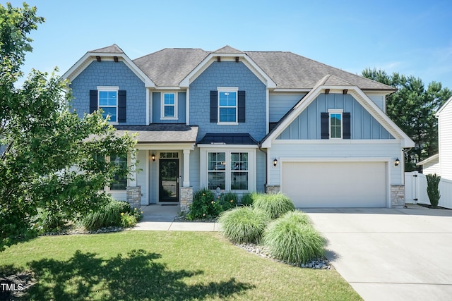 3536 Greenville Loop Rd, Wake Forest, NC 27587 - craftsman inspired home featuring driveway, board and batten siding, a shingled roof, and an attached garage