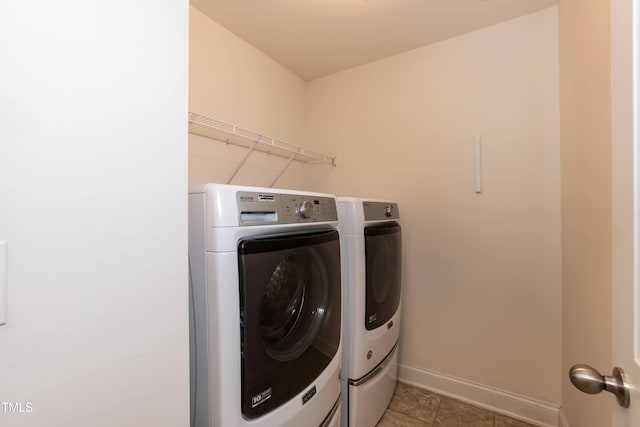 3536 Greenville Loop Rd, Wake Forest, NC 27587 - washroom with washing machine and dryer and baseboards