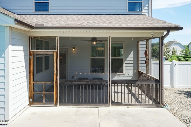 3536 Greenville Loop Rd, Wake Forest, NC 27587 - view of exterior entry featuring a shingled roof, a ceiling fan, and a security system