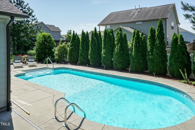 3536 Greenville Loop Rd, Wake Forest, NC 27587 - outdoor pool with a fenced backyard and a patio area