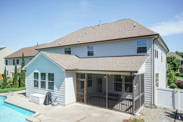 3536 Greenville Loop Rd, Wake Forest, NC 27587 - rear view of property with a patio area, an outdoor pool, roof with shingles, and a sunroom