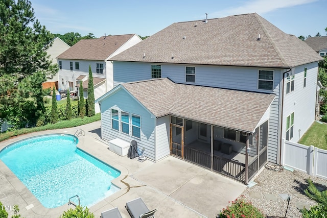 3536 Greenville Loop Rd, Wake Forest, NC 27587 - back of property featuring roof with shingles, a sunroom, and a patio