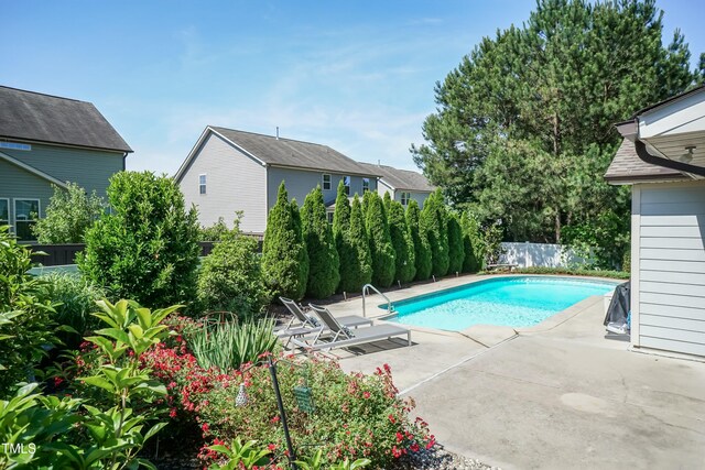 3536 Greenville Loop Rd, Wake Forest, NC 27587 - view of swimming pool featuring a fenced backyard and a patio