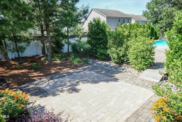 3536 Greenville Loop Rd, Wake Forest, NC 27587 - fenced backyard with a patio