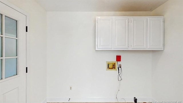 6976 Kings Lynn Loop, Fayetteville, NC 28304 - washroom featuring hookup for a washing machine and cabinet space