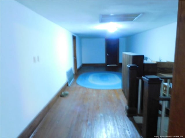 1042 Oquinn Rd, Maxton, NC 28364 - hallway featuring wood finished floors and baseboards