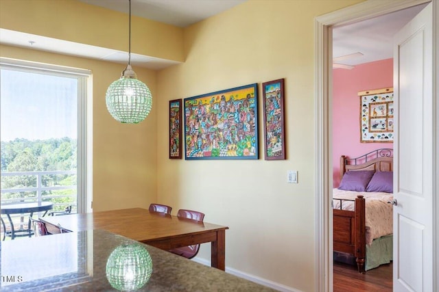 dining area featuring baseboards