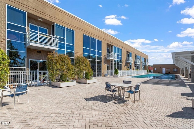 community pool with a patio
