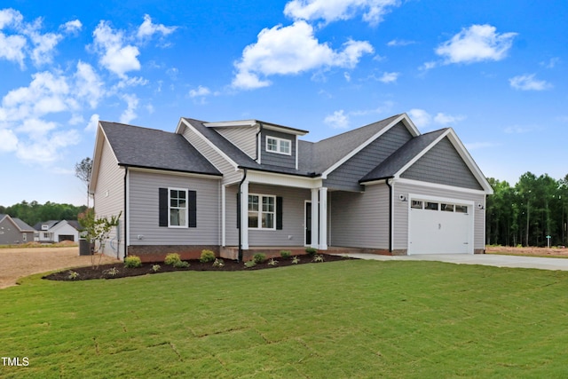 157 Gumtop Dr, Zebulon, NC 27597 - craftsman-style home with a garage, concrete driveway, a front lawn, and a porch
