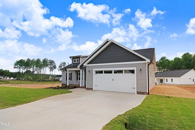157 Gumtop Dr, Zebulon, NC 27597 - craftsman house featuring concrete driveway, a garage, and a front lawn