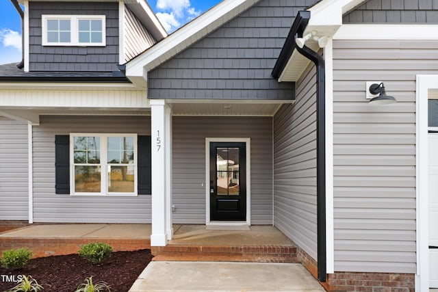 157 Gumtop Dr, Zebulon, NC 27597 - view of exterior entry with a porch