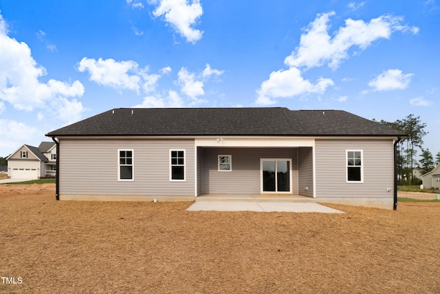 157 Gumtop Dr, Zebulon, NC 27597 - back of property with a patio area and roof with shingles