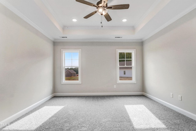 157 Gumtop Dr, Zebulon, NC 27597 - unfurnished room featuring plenty of natural light, a tray ceiling, crown molding, light colored carpet, and recessed lighting