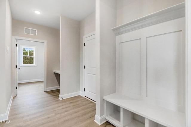 157 Gumtop Dr, Zebulon, NC 27597 - mudroom with light wood-type flooring, baseboards, and recessed lighting