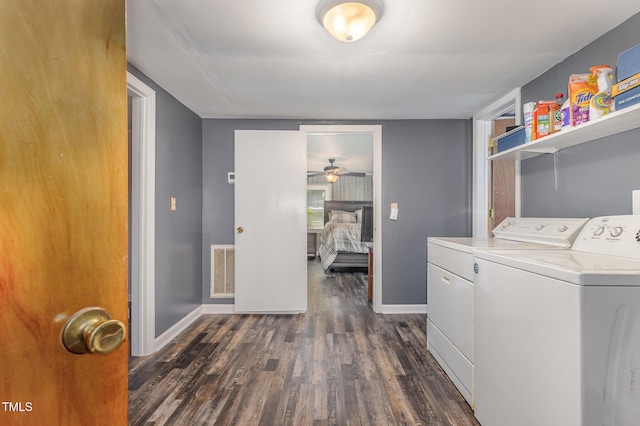 1169 Clayhole Rd, Dunn, NC 28334 - laundry room featuring washer and clothes dryer, dark wood-style floors, and ceiling fan