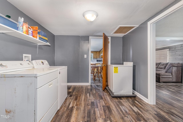 1169 Clayhole Rd, Dunn, NC 28334 - washroom featuring washing machine and dryer and dark wood-type flooring