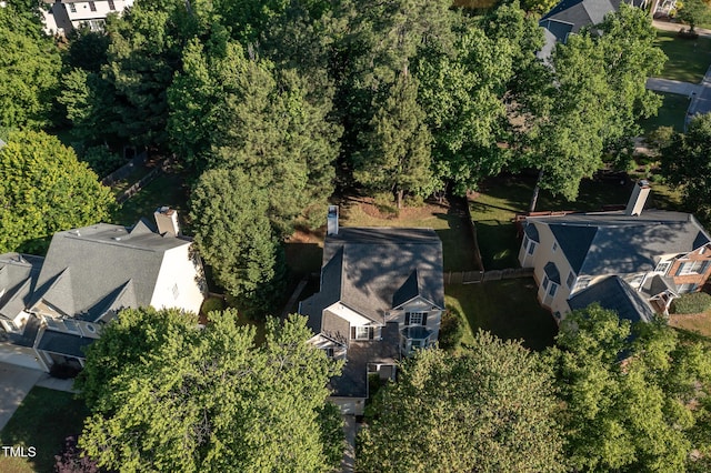 aerial overview of property's location with nearby suburban area