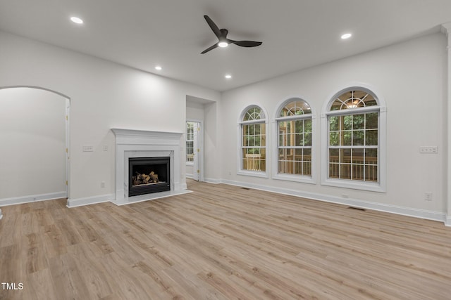 100 Citrus Pl, Cary, NC 27519 - unfurnished living room with a ceiling fan, light wood-type flooring, recessed lighting, and baseboards