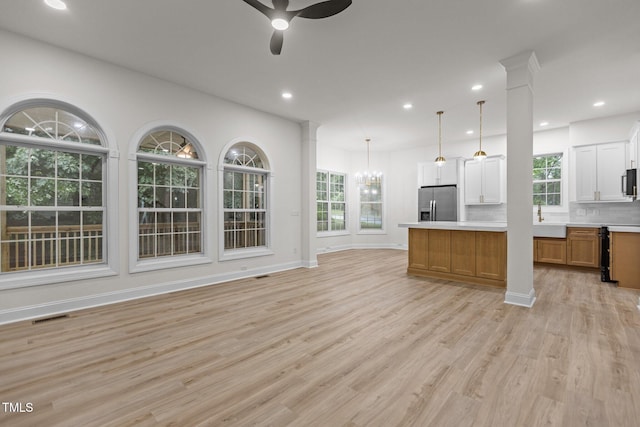 100 Citrus Pl, Cary, NC 27519 - kitchen with stainless steel refrigerator with ice dispenser, a ceiling fan, a chandelier, plenty of natural light, and recessed lighting