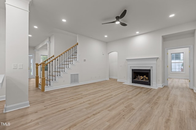 100 Citrus Pl, Cary, NC 27519 - unfurnished living room with a ceiling fan, plenty of natural light, light wood-style flooring, and recessed lighting