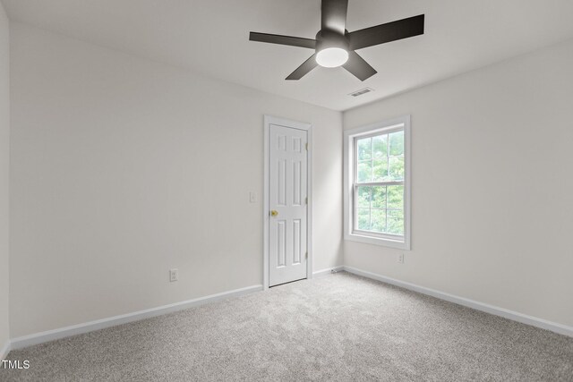 100 Citrus Pl, Cary, NC 27519 - spare room featuring baseboards, carpet flooring, and a ceiling fan