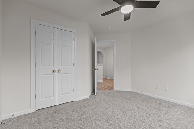 100 Citrus Pl, Cary, NC 27519 - unfurnished bedroom with carpet floors, baseboards, ceiling fan, and a closet