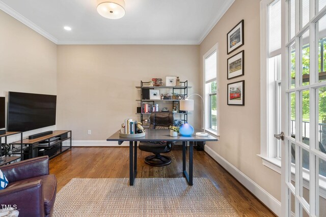 office with crown molding, wood finished floors, and baseboards