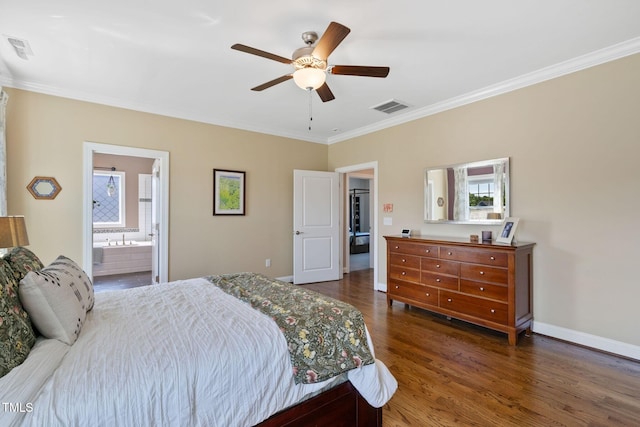 bedroom with ornamental molding, wood finished floors, a ceiling fan, baseboards, and connected bathroom