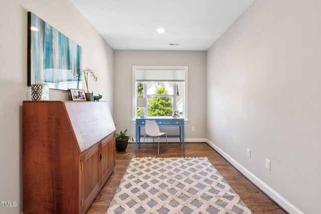 office area featuring wood finished floors and baseboards