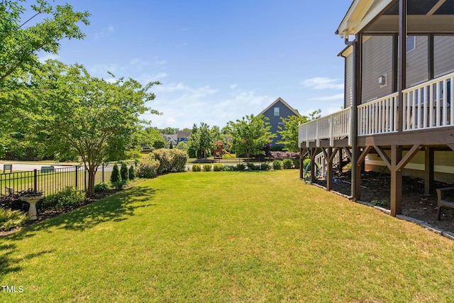 view of yard featuring a wooden deck