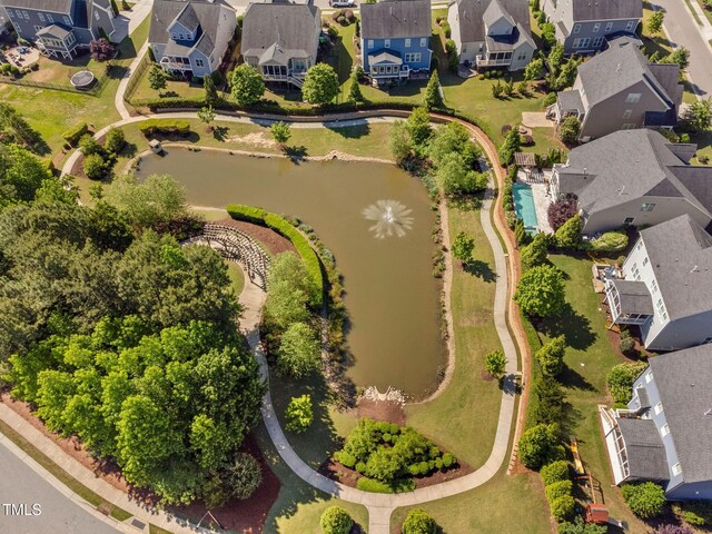 aerial view of residential area with a nearby body of water
