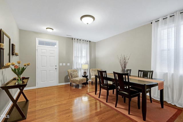 1141 Brookhill Way, Cary, NC 27519 - dining room with light wood-type flooring and baseboards