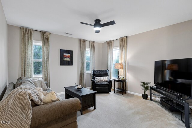 1141 Brookhill Way, Cary, NC 27519 - living area featuring ceiling fan, baseboards, and light carpet