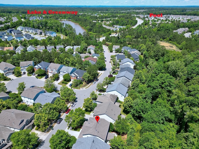 1141 Brookhill Way, Cary, NC 27519 - aerial view of residential area featuring a heavily wooded area and a nearby body of water
