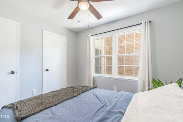 bedroom featuring a ceiling fan