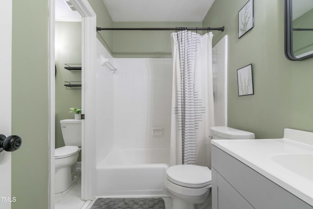 bathroom featuring toilet, marble finish floors, shower / bathtub combination with curtain, and vanity