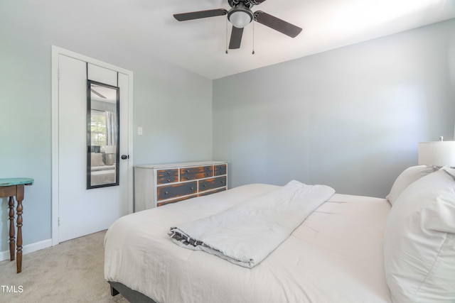 bedroom with carpet floors, baseboards, and ceiling fan