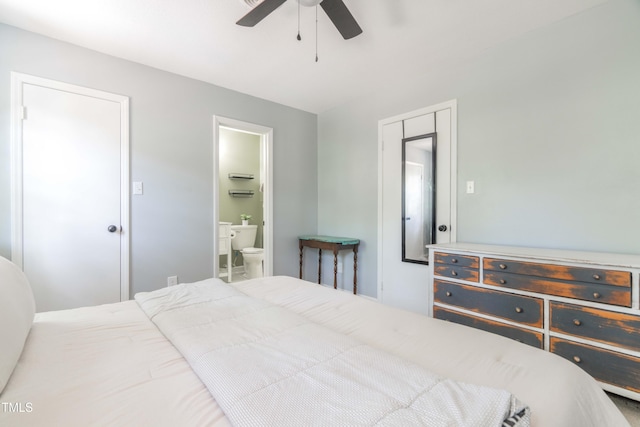 bedroom with ensuite bath and a ceiling fan