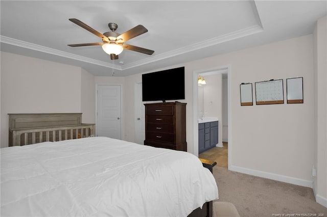 bedroom featuring baseboards, a raised ceiling, ornamental molding, and light colored carpet