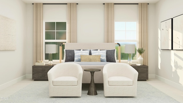 bedroom featuring baseboards