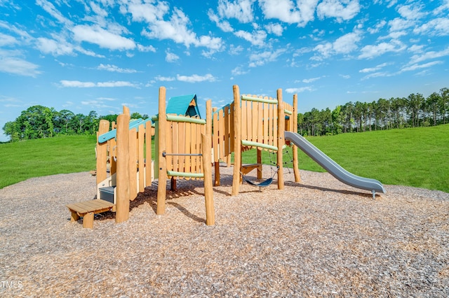 community play area with a lawn